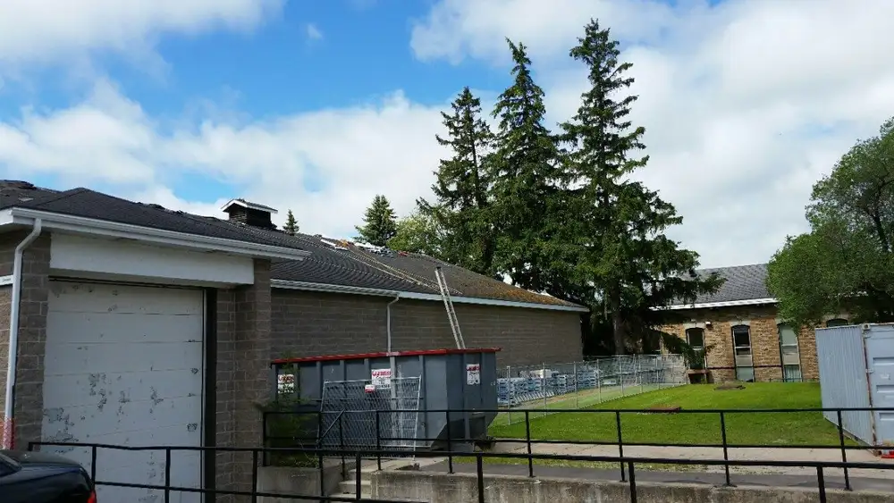 Sloped shingle roof installed by Sinclair Industrial Roofing