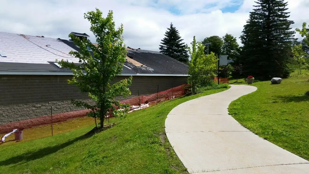 Sloped metal roofing installation